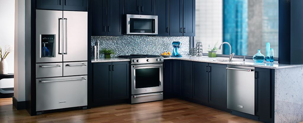 Energy-efficient kitchen appliances in Texas home showing modern fridge, stove, and dishwasher for monthly savings